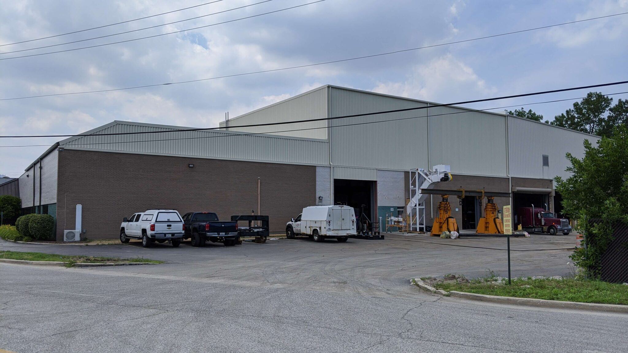 ODM Manufacturing exterior showing renovation/roof addition